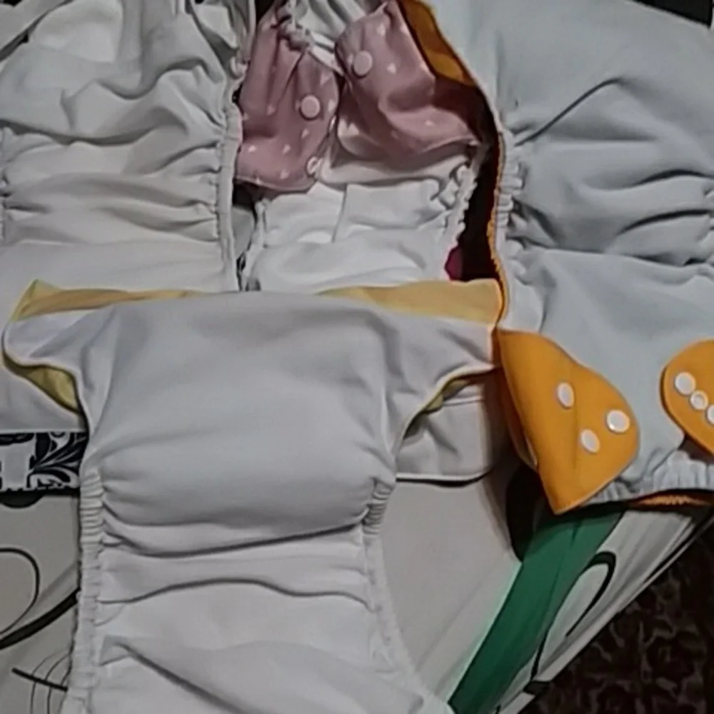 BumGenius Cloth Diaper Covers in Pink, Yellow, Mustard